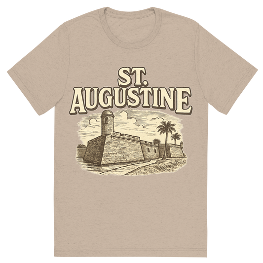 Front view of a Premium Tri-Blend Crew Neck T-Shirt in Tan showing 'A typographic, nostalgic graphic of a typographic illustration of the words 'st. augustine' with a vintage line art drawing of the castillo de san marcos'