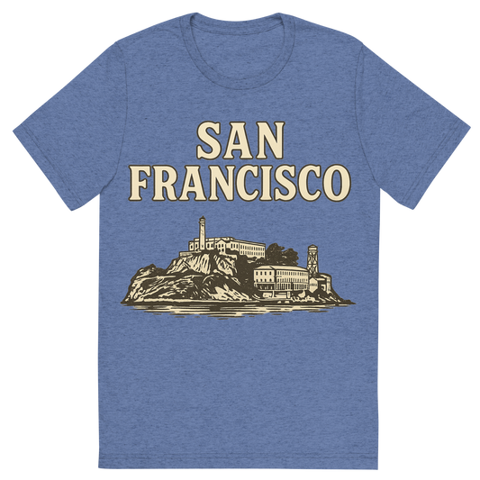 Front view of a Premium Tri-Blend Crew Neck T-Shirt in Blue showing 'A typographic, nostalgic graphic of a typographic illustration of the words 'san francisco' with a vintage line art drawing of alcatraz island'