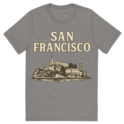 Front view of a Premium Tri-Blend Crew Neck T-Shirt in Grey showing 'A typographic, nostalgic graphic of a typographic illustration of the words 'san francisco' with a vintage line art drawing of alcatraz island'