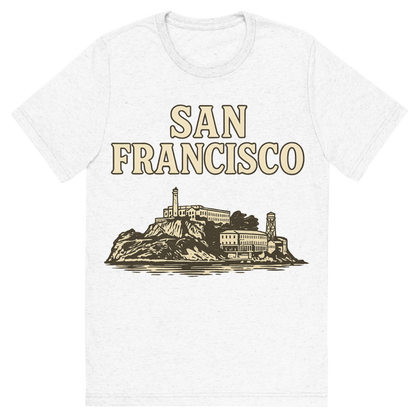 Front view of a Premium Tri-Blend Crew Neck T-Shirt in Solid White showing 'A typographic, nostalgic graphic of a typographic illustration of the words 'san francisco' with a vintage line art drawing of alcatraz island'