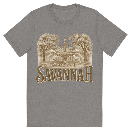Front view of a Premium Tri-Blend Crew Neck T-Shirt in Grey showing 'A typographic, nostalgic graphic of a typographic illustration of the words 'savannah' with a vintage line art drawing of forsyth park'
