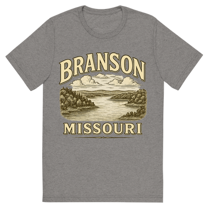 Front view of a Premium Tri-Blend Crew Neck T-Shirt in Grey showing 'A typographic, nostalgic graphic of a typographic illustration of the words 'branson, missouri' with a vintage line art drawing of the table rock lake'