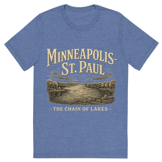 Front view of a Premium Tri-Blend Crew Neck T-Shirt in Blue showing 'A typographic, nostalgic graphic of a typographic illustration of the words 'minneapolis-st. paul' with a vintage line art drawing of the chain of lakes'