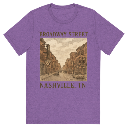 Front view of a Premium Tri-Blend Crew Neck T-Shirt in Purple showing 'A hand-drawn, nostalgic graphic of nashville, tennessee featuring broadway street'