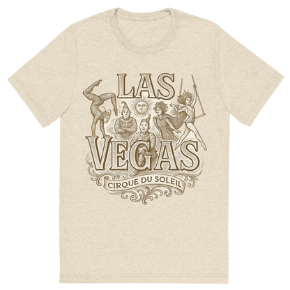 Front view of a Premium Tri-Blend Crew Neck T-Shirt in Oatmeal showing 'A typographic, nostalgic graphic of a typographic illustration of the words 'las vegas' with a vintage line art drawing of the cirque du soleil shows'