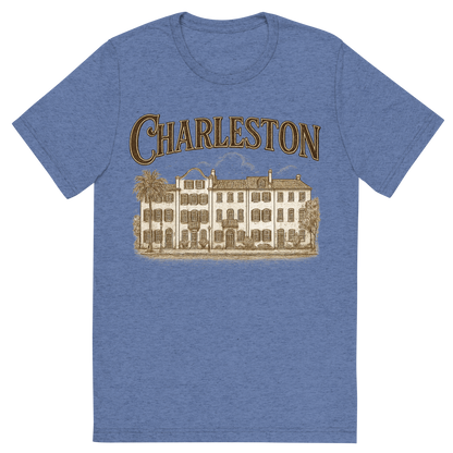 Front view of a Premium Tri-Blend Crew Neck T-Shirt in Blue showing 'A typographic, nostalgic graphic of a typographic illustration of the words 'charleston' with a vintage line art drawing of the rainbow row'
