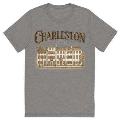 Front view of a Premium Tri-Blend Crew Neck T-Shirt in Grey showing 'A typographic, nostalgic graphic of a typographic illustration of the words 'charleston' with a vintage line art drawing of the rainbow row'