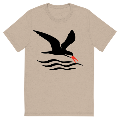 Front view of a Premium Tri-Blend Crew Neck T-Shirt in Tan showing 'A high-contrast silhouette with minimal accent color, swift graphic of a silhouette of a black skimmer gliding low over the waves with its lower bill skimming the surface, red-orange bill tip highlighted, transparent background, optimized for dtg printing'
