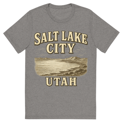 Front view of a Premium Tri-Blend Crew Neck T-Shirt in Grey showing 'A typographic, nostalgic graphic of a typographic illustration of the words 'salt lake city, utah' with a vintage line art drawing of the great salt lake'