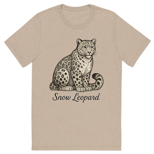 Front view of a Premium Tri-Blend Crew Neck T-Shirt in Tan showing 'A flat, neutral graphic of a  illustration of a snow leopard with thick fur, curled tail, and spotted coat. “snow leopard” is written below in graceful script. detailed ink illustration on a white background.'