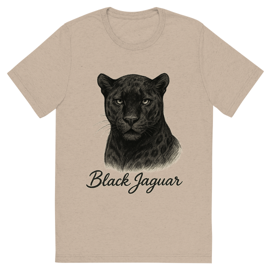 Front view of a Premium Tri-Blend Crew Neck T-Shirt in Tan showing 'A flat, neutral graphic of a powerful sketch of a black jaguar with subtle rosettes and shadowy features. “black jaguar” is written in flowing script below.'