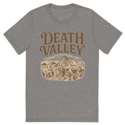 Front view of a Premium Tri-Blend Crew Neck T-Shirt in Grey showing 'A typographic, nostalgic graphic of a typographic illustration of the words 'death valley' with a vintage line art drawing of zabriskie point'