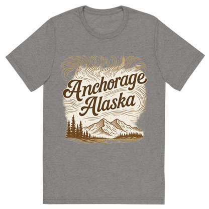 Front view of a Premium Tri-Blend Crew Neck T-Shirt in Grey showing 'A typographic, nostalgic graphic of a typographic illustration of the words 'anchorage, alaska' with a vintage line art drawing of the northern lights'