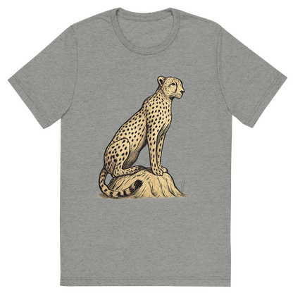 Front view of a Premium Tri-Blend Crew Neck T-Shirt in Athletic Grey showing 'A hand-drawn ink with color pops, focused graphic of a sleek cheetah perched atop a termite mound, scanning the horizon with alert eyes, illustrated in hand-drawn ink with soft tan and black details, centered composition, transparent background, optimized for dtg printing'